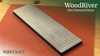 10-inch rectangular diamond sharpening stone with perforated metal surface on workbench mat