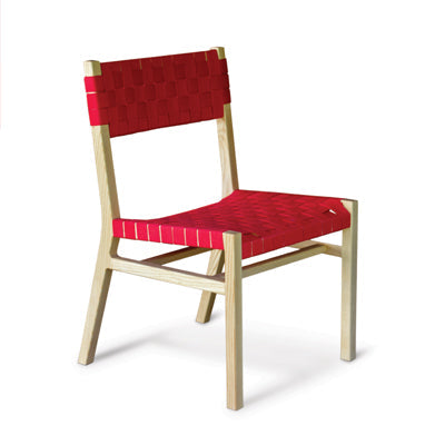 Contemporary dining chair with a woven red seat and backrest, showcasing modern woodworking design.