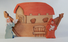 Wooden puzzle of Noah's Ark with interlocking pieces and painted human figures holding animals