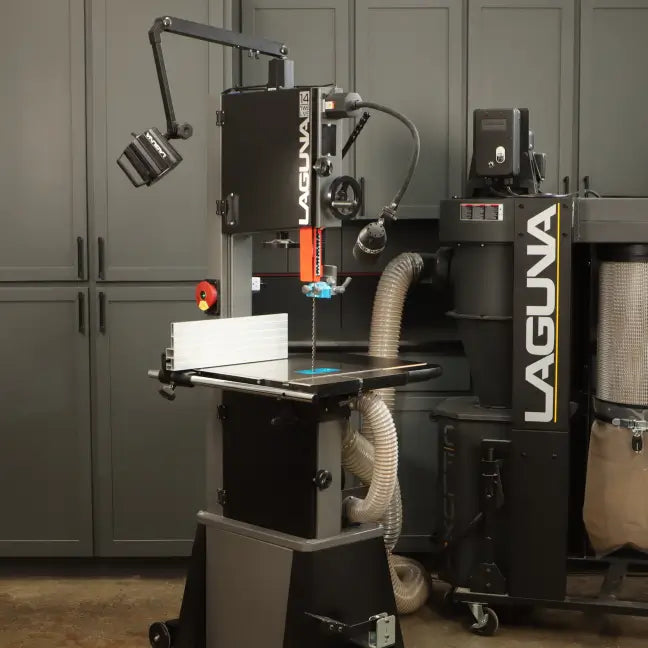 Woodworking machine with Laguna branding in a workshop setting