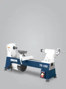 Blue and white metal lathe on a gray background